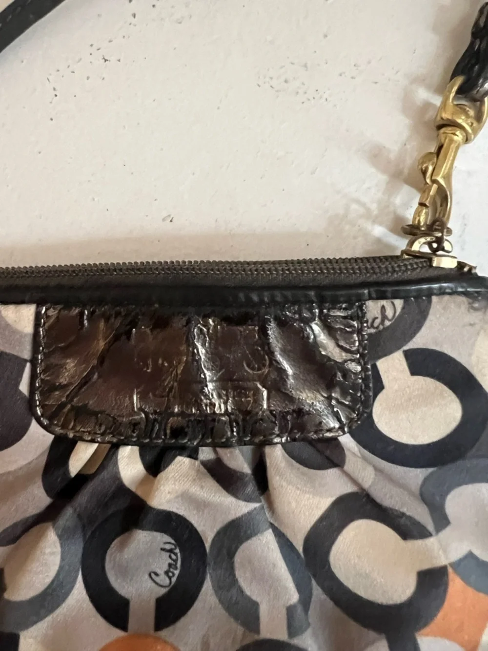Coach Small Signature Circle Print Wristlet in Black, Tan and Gray